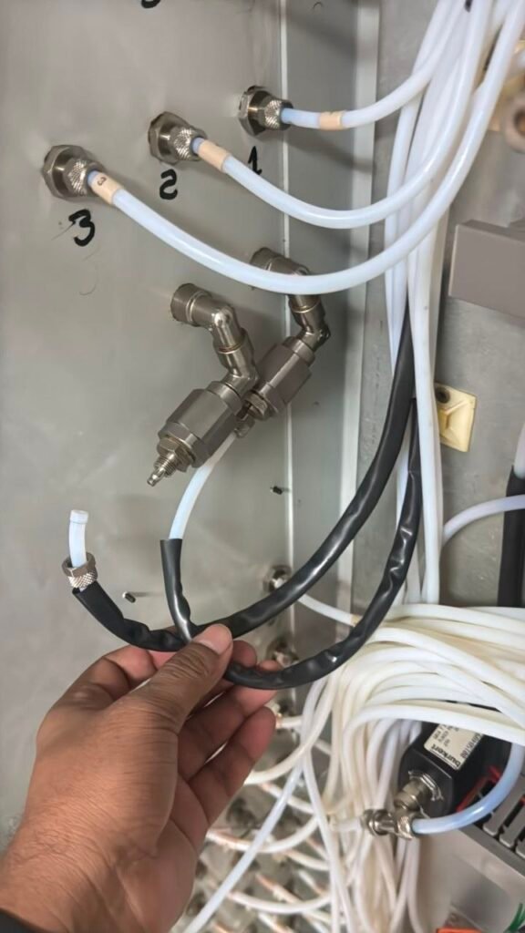 Sample point selector manifold with numbered ports on fixed gas detection panel